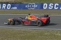 Max verstappen in a formule 1 car on circuit zandvoort