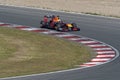 Max verstappen in a formule 1 car comes racing into the corner on circuit zandvoort