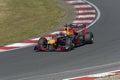 Max verstappen in a formule 1 car comes racing out of the corner on circuit zandvoort