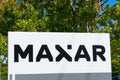 Maxar sign and logo. Maxar Technologies is a space technology company Royalty Free Stock Photo