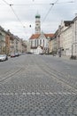 Maximilian street with church St Ulrich and Afra in Augsburg