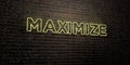 MAXIMIZE -Realistic Neon Sign on Brick Wall background - 3D rendered royalty free stock image