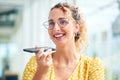 Maximize your productivity with modern technology. a young businesswoman using a smartphone in a modern office. Royalty Free Stock Photo