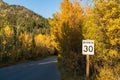 Maximum 30 km speed limit sign in Vermilion Lakes road in autumn. Banff National Park.