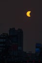 Maximum partial solar eclipse over building in Bangkok, Thailand Royalty Free Stock Photo