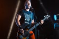 Maxym Krasnooky, bassist of Ukrainian rock group Mad Heads at live concert in Pobuzke, Ukraine, 15.07.2017, editorial photo