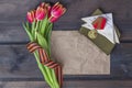 9 May background - George ribbon, note paper, red flowers front-line letters, military cap and orders on the wooden background. Royalty Free Stock Photo