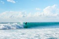 5 May 2019 : Balangan Beach, Bali, Indonesia - Man riding wave on a sunny summers day