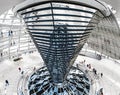 Futuristic architecture of a Glass Dome with crowds of people on the roof of the Reichstag building