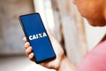 May 27, 2023, Brazil. The Caixa EconÃÂ´mica Federal (CEF) logo is displayed on a smartphone screen