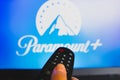 May 10, 2022, Brazil. In this photo illustration a close-up of a hand holding a TV remote control seen in front of the Paramount