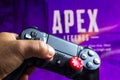 May 17, 2021, Brazil. In this photo illustration the controller for PlayStation PS and in the background the game logo Apex Royalty Free Stock Photo
