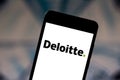 May 28, 2019, Brazil. In this photo illustration the Deloitte Touche Tohmatsu Limited logo is displayed on a smartphone Royalty Free Stock Photo