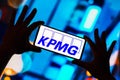 May 4, 2023, Brazil. In this photo illustration, the KPMG logo is displayed on a smartphone screen