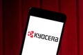 May 17, 2019, Brazil. In this photo illustration the Kyocera Corporation logo is displayed on a smartphone Royalty Free Stock Photo