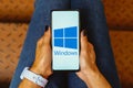 May 23, 2023, Brazil. In this photo illustration, the Microsoft Windows logo is displayed on a smartphone screen