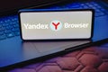 May 15, 2023, Brazil. In this photo illustration, the Yandex Browser logo is displayed on a smartphone screen