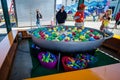 A bobbing fishing carnival game on the Coney Island boardwalk awaits customers on an early spring