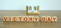 May 9 on the calendar. Victory Day. Calendar on a white background. Words victory day on wooden cubes. The concept of one day a Royalty Free Stock Photo