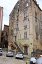 May 27 2023 - Corte, Island of Corsica, France: Tourists walking in historic downtown of Corte city in Corsica surrounded by Royalty Free Stock Photo