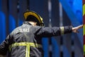 24 may 2023, Costa da Caparica, Portugal - Bombeiros - firefighter at work from the back