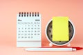 May 2024 desk calendar With Adhesive Note on Alarm Clock Royalty Free Stock Photo