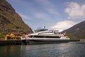 Norwegian Ã¯Â»Â¿Ã¯Â»Â¿Traveller sitting in a Cruise at Flam port waiting for departure to Gudvangen