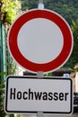 flood warning sign in German language, Hochwasser Royalty Free Stock Photo