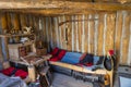 MAY 20, FORT MANDAN, NORTH DAKOTA, USA - Interior of Historic Fort Mandan, North Dakota with uniforms - wintering location for Royalty Free Stock Photo