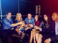 May the fun never end. a group of friends toasting with drinks at a party. Royalty Free Stock Photo
