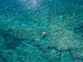 May 15 2016, Haleiwa Hawaii. Aerial view of an unknown Stand up Paddle boarder surfing in the Ocean