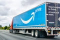May 26, 2019 Hayward / CA / USA - Amazon truck driving on the freeway, the large Prime logo printed on the side; San Francisco bay