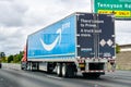 May 26, 2019 Hayward / CA / USA - Amazon truck driving on the freeway, the large Prime logo printed on the side; San Francisco bay