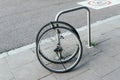 May 09, 2020. Krakow, Poland. Bike wheels with padlock. Theft of a bicycle. Bicycles stolen and left only wheels. Bicycle theft Royalty Free Stock Photo