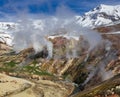 May landscape with columns of steam and gases in the Valley of Geysers