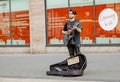 Young hipster man plays the guitar on the street. Rock style