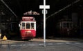 A traditional tram wagon waiting in the shade of the station at the end of the day. Royalty Free Stock Photo