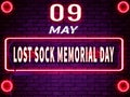 09 May, Lost Sock Memorial Day. Neon Text Effect on Bricks Background Royalty Free Stock Photo