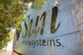 May 26, 2019 Menlo Park / CA / USA - Sun Microsystems logo on the back of the Facebook Thumbs Up sign; Facebook took over their