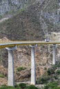 Truck is driving across a tall bridge in Mexico
