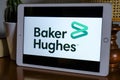 May 2021 Milan, Italy: Baker Hughes company logo icon close-up on tablet screen in the office. Baker Hughes illustrative brand