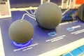 May 2022 Milan, Italy: Echo audio speaker close-up in the electronics store. Echo Amazon logo icon