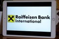 May 2022 Milan, Italy: Raiffeisen Bank International company logo icon close-up on tablet screen. Raiffeisen Bank International il