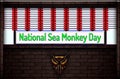 May month special day. National Sea Monkey Day, Neon Text Effect on Bricks Background Royalty Free Stock Photo