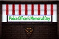 May month special day. Police Officer's Memorial Day, Neon Text Effect on Bricks Background