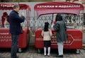 02 may 2021 ,Moscow,Red Square .family on a walk in the city buys ice cream to a child from a mobile tray