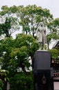 Japanese guy sit under tree in Nittai-ji temple, Nagoya - Japan