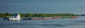 MAY 1, 2019, NEW MADRID, MO., USA - Barge heads North up Mississippi River towards St. Louis as seen from New Madrid, MO