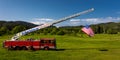 MAY 29, 2019, OTIS OREGON, USA - Fire Truck and flag promotes Music Festival along Highway 101, Otis, Oregon Royalty Free Stock Photo