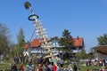 May Pole setting up in Bavaria on May Day